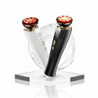 Black and white handheld device with red lights on a white background