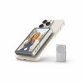 Smartphone with a mirror attachment on a white background