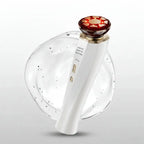 White electronic device with a Red Light Facial Massager on a white background