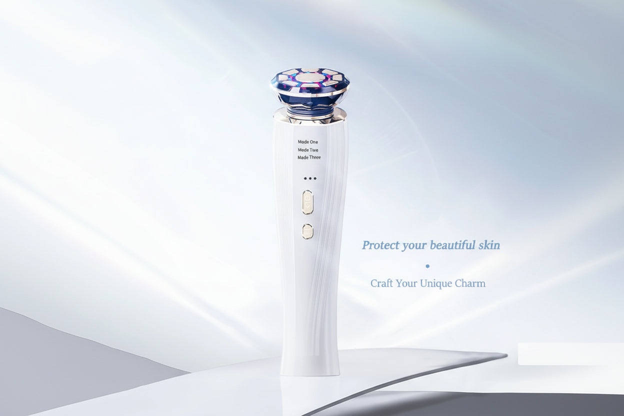 White electronic device with blue top on a light gray background