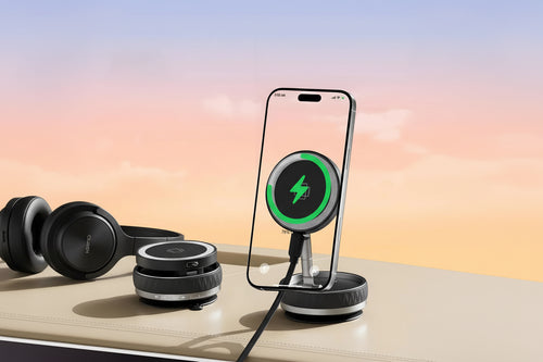 Smartphone with wireless charging pad and headphones on a gradient background with '
