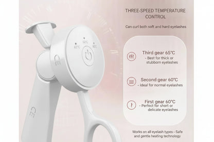white eyelash curler with temperature control details on a light pink background