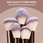 Set of makeup brushes with fluffy, soft fiber wool on a beige background