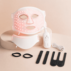 White premium LED face and neck mask set with remote, charging cable, eye inserts, and adjustable straps