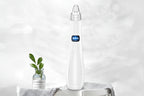 Blackhead remover vacuum device demo removing blackheads and cleaning pores.