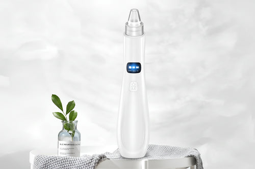 Blackhead remover vacuum device demo removing blackheads and cleaning pores.